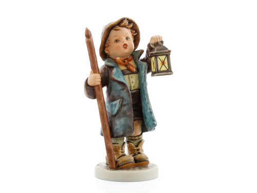 M.I. Hummel figurine HUM 2415 Young Guardian featuring a young night watchman with a lantern and halberd, handcrafted in Germany.