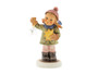 Holiday Fun HUM 2204 Swarovski Edition M.I. HUMMEL figurine of a girl with a Christmas ornament