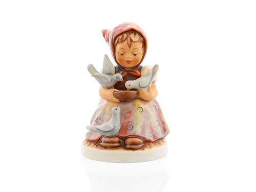 M.I. Hummel figurine HUM 337 Cinderella featuring a young girl sitting with doves helping her sort lentils, handcrafted in Germany.