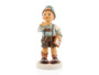 M.I. Hummel figurine HUM 2429 Multiplication Tables featuring a young school boy calculating math problems, handcrafted in Germany.