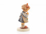 Close-up of the red hair bow and slippers on the M.I. Hummel Evening Prayer figurine