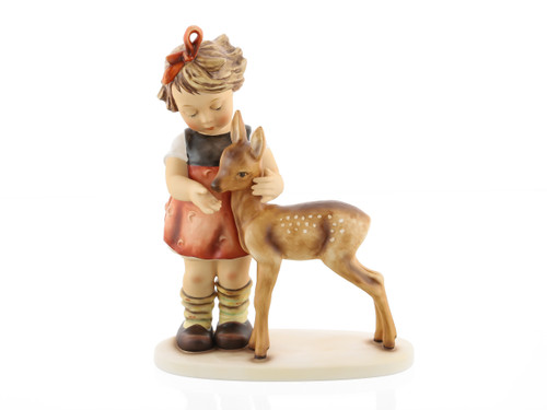 M.I. Hummel figurine HUM 136/I Friends featuring a young girl standing next to a small spotted fawn, handcrafted in Germany.