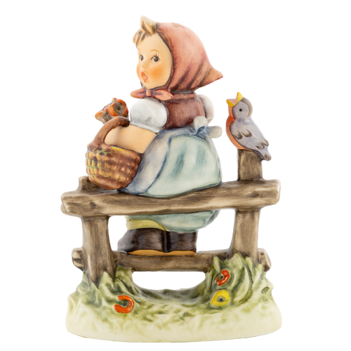 M.I. Hummel figurine HUM 426/3/0 Pay Attention featuring a young girl sitting with a bouquet and a small bird perching nearby, handcrafted in Germany.