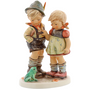 M.I. Hummel figurine HUM 394 Timid Little Sister featuring a protective brother and a young girl looking at a small frog, handcrafted in Germany.