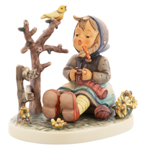 M.I. Hummel figurine HUM 929 Favorite Pastime featuring a young girl with a blue headscarf knitting on a branch with a yellow bird, handcrafted in Germany