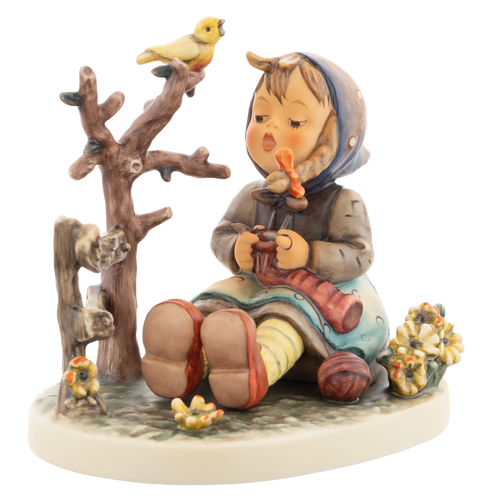 M.I. Hummel figurine HUM 929 Favorite Pastime featuring a young girl with a blue headscarf knitting on a branch with a yellow bird, handcrafted in Germany