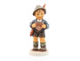 M.I. Hummel figurine HUM 2447 We Belong Together featuring a boy in traditional Lederhosen holding a gingerbread heart that says "Darling."