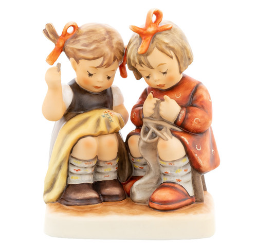 Starting Young Hum 469 M.I. Hummel Club 45th Anniversary figurine featuring two young girls sewing and knitting.