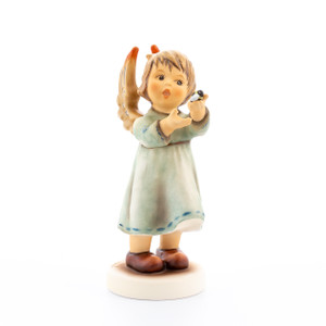 M.I. Hummel Annual Angel 2021 figurine HUM 2443, a girl angel with a tiny bumblebee on her hand, hand-painted porcelain.