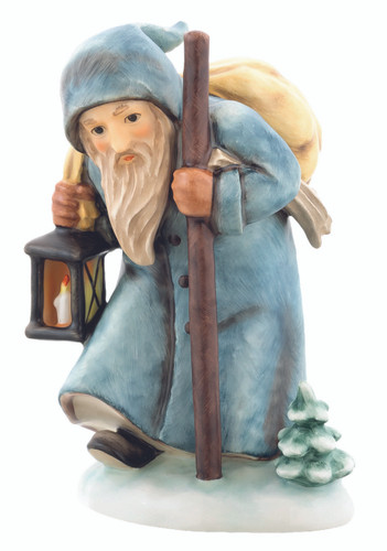 Ruprecht HUM 473 M.I. HUMMEL figurine of St. Nicholas' helper with lantern and sack. Close-up of the blue hooded robe and detailed face of the Hummel Ruprecht figurine by Gerhard Skrobek.