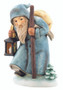 Ruprecht HUM 473 M.I. HUMMEL figurine of St. Nicholas' helper with lantern and sack. Close-up of the blue hooded robe and detailed face of the Hummel Ruprecht figurine by Gerhard Skrobek.