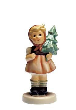 Girl with Fir Tree Hum 239/D M.I. Hummel figurine carrying a Christmas evergreen tree.