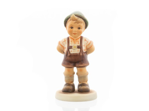 Authentic M.I. Hummel Secret Admirer figurine HUM 2102/B wearing traditional German lederhosen and an alpine hat.