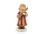 2025 M.I. Hummel Annual Angel figurine HUM 2455, featuring a serene angel in a rustic red robe holding an olive branch, a symbol of peace.