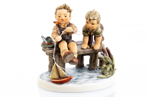 Exclusive 50th Anniversary M.I. Hummel Club figurine 'Little Captains' HUM 2083 featuring two boys launching a sailboat.