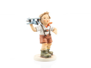 Authentic M.I. Hummel figurine HUM 2173 showing a young boy running with a toy airplane ready to fly.