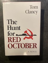 The Hunt for Red October.[Suspense novel about a chase for a
