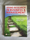 Doing Research in Business and Management: an essential guide to
