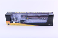 1/64 Black DCP Peterbilt 389 Day Cab Semi With Landoll 440 Traveling Axle Trailer