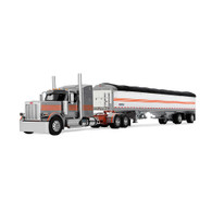 1/64 DCP First Gear silver/orange Peterbilt 589 72" midroof sleeper with spread axle grain trailer
