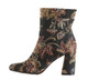 Side view: Patchwork places by Poetic Licence. Brocade floral fabric upper, retro mid calf boot, square heel and tapered toe. Black Floral brocade fabric.