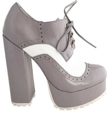 Side View: Women's Shoes, Women's Heels, Jeffrey Campbell Pomeroy, Platform brogues in Grey and white color block. Patent leather upper and leather lining. Size 6.5