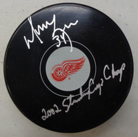 Manny Legace Autographed Detroit Red Wings Souvenir Puck w/ "2002 Stanley Cup Champ"
