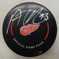Alex DeBrincat Autographed Detroit Red Wings Game Puck