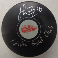 Henrik Zetterberg Autographed Red Wings Puck Inscribed "Triple Gold Club"