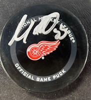 Moritz Seider 2021-22 Autographed Detroit Red Wings Game Puck