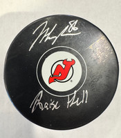 Jack Hughes Autographed New Jersey Devils Logo Puck with Raise Hell Inscription