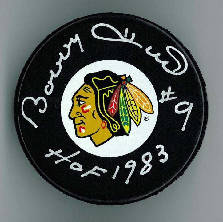 Bobby Hull Autographed Hockey Puck inscribed The Golden Jet Chicago Blackhawks 