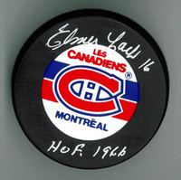 Elmer Lach Autographed Canadiens Puck w/ "HOF"
