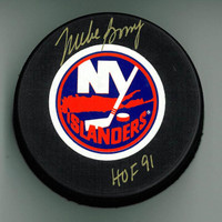 Mike Bossy Autographed Islanders Puck w/ "HOF" (Large Logo Gold Auto)