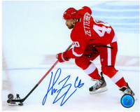 Henrik Zetterberg Autographed Detroit Red Wings 8x10 Photo #5 - Skating with Puck