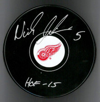 Nicklas Lidstrom Autographed Detroit Red Wings Souvenir Puck Inscribed "HOF 15"