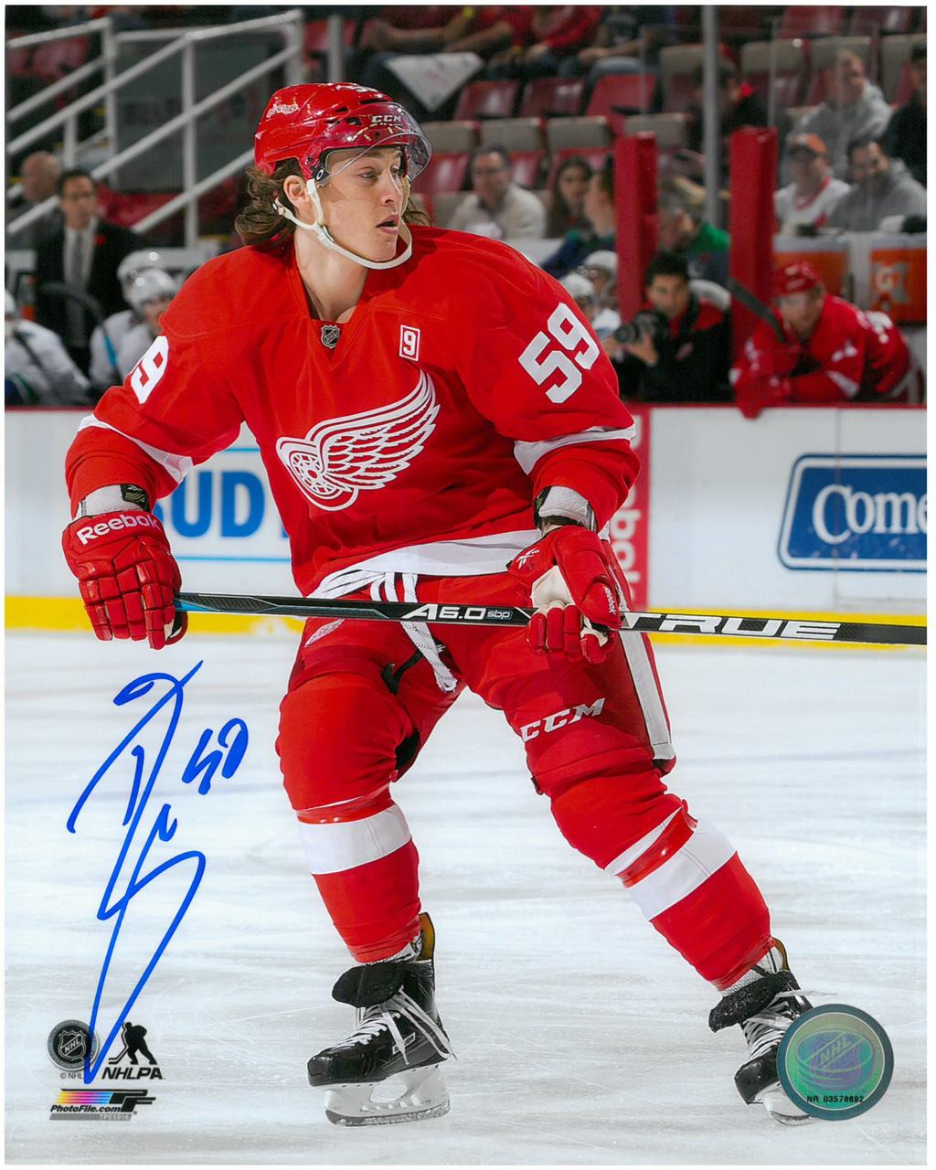 TYLER BERTUZZI AUTOGRAPHED DETROIT RED WINGS 8X10 PHOTO #2 ROAD ACTION