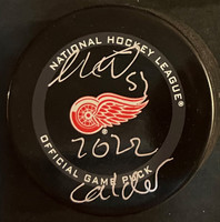 Moritz Seider Autographed Detroit Red Wings Game Puck w/ 2022 Calder