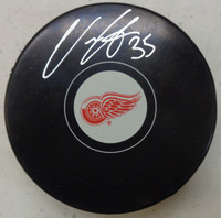 Ville Husso Autographed Red Wings Souvenir Puck