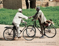Burkina Faso

Two men approach each other on bicycles. They have other places to go but still find time to stop and shake hands, not once, but nearly a dozen times as they inquire about the health and happiness of each other’s family. Handshaking is more than a superficial greeting in Burkina Faso. It reflects the deep cultural belief that strong bonds of friendship and family take precedence over all else. No matter how busy life is, there is always time for a handshake.

Photo © 2003 Matt McClure; featured in the 2006 International Calendar