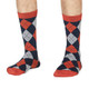 Thought Bamboo Socks for Men. SPM703 'Philip Argyll' : Spiced Orange - two socks shown on a model's feet