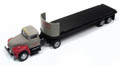Gray tractor body with red fenders. Black and gray flatbed trailer