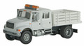 SceneMaster #11894 International 4900 Stake Bed Utility Truck - White (HO)