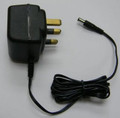 AC-DC Adaptor, Input : AC220V ~ 50Hz UK type, Output : DC9V 300mA, Center Positive 2.1mm