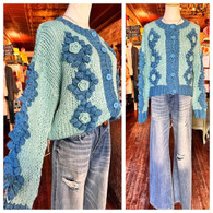 Absolutely swooning over this hand crochet, flower detailed cardigan w exquisite flower and dot detailing in aqua and teal 