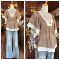 This is the cutest flare cape sleeve blouse in mocha and ivory //semi sheer //wear w cami