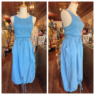 Super fun cargo midi dress w ribbed top, front and side pockets, waist tie and tie hem in cornflower