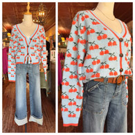 Oh heavens this chenille cherry knit button down cardigan in soft blue is sooooooo stinking cute