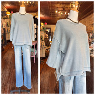 Half sleeve mineral washed light weight sweater in blue w rolled hem and side slits