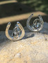 Plate horseshoe or race shoe cufflinks with initials. Cufflinks are an accessory that are essential in the horse show world and in the business world. They accentuate any suit, whether business or riding. Available in sterling silver or gold. Please specify which letters you wish to include.
